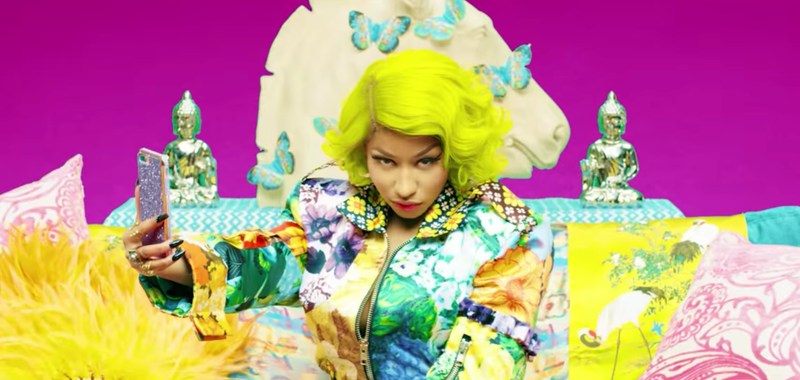 Illustration for article titled Nicki Minaj Joins BTS's Freaky Neon K-Pop Universe For 'Idol'